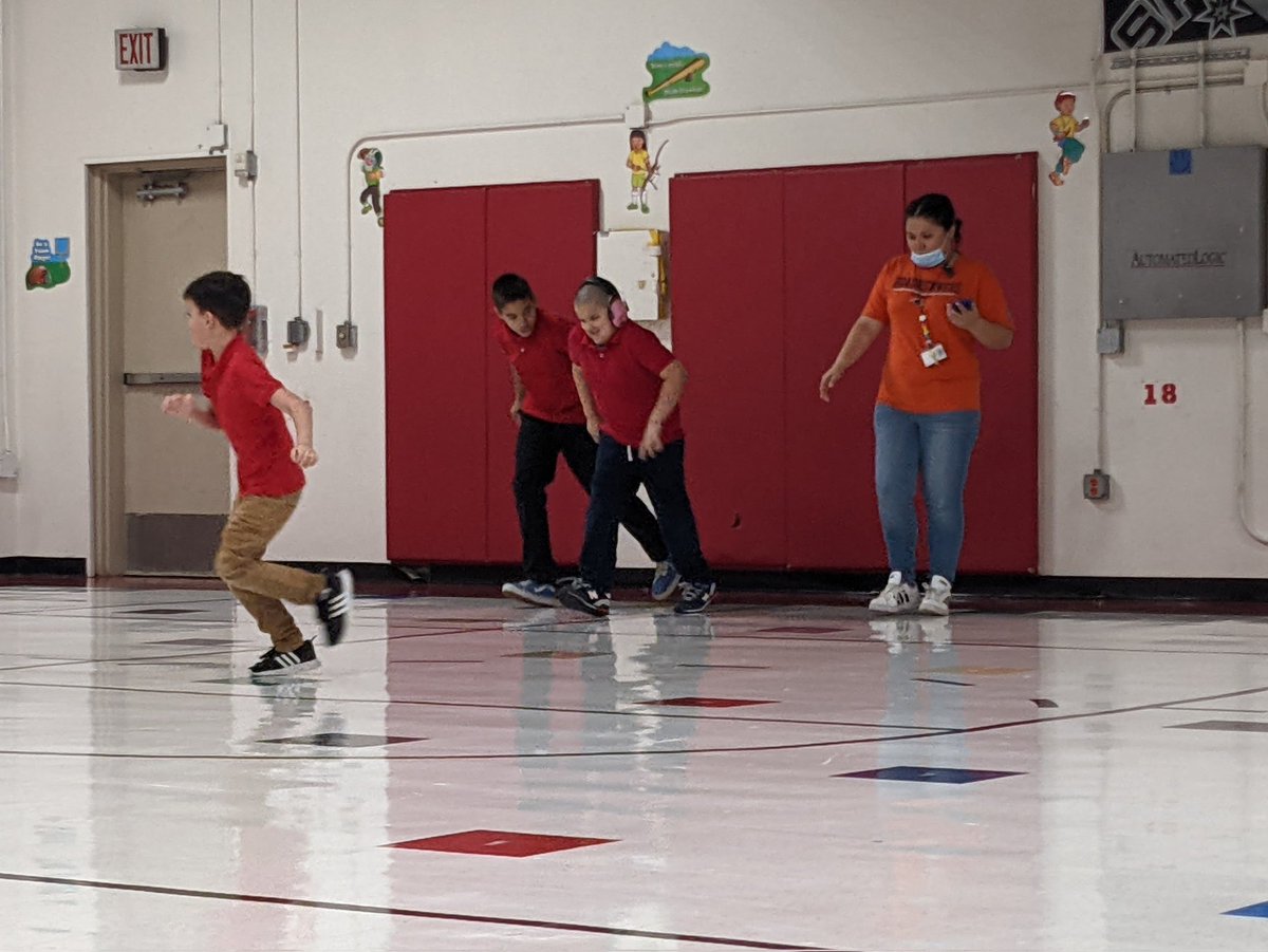 EdgewoodPT's tweet photo. Ms. Fernandez @LBJelem having fun with her students creating some friendly competition with races in the gym! @EISDSpecial https://t.co/AM7GP4UCHH
