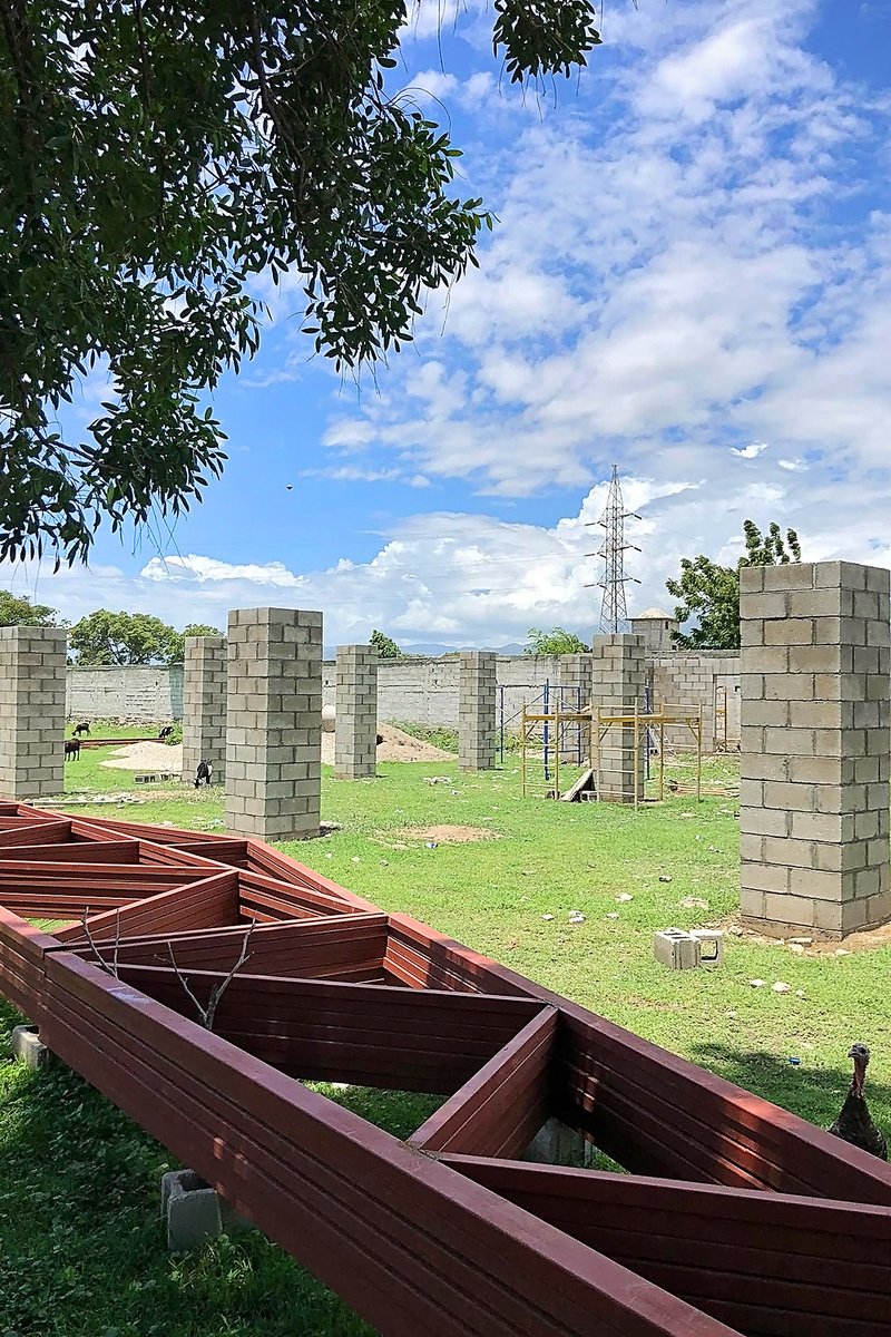 HeartlineHaiti's tweet photo. The Heartline Auditorium is beginning to take form on our Education and Employment Campus (EEC). We're so excited to celebrate the achievements of students and community members in this new facility! #Haiti #LocalLabor #InvestinFamilies #EconomicEmpowerment https://t.co/CT4gFXD2ru
