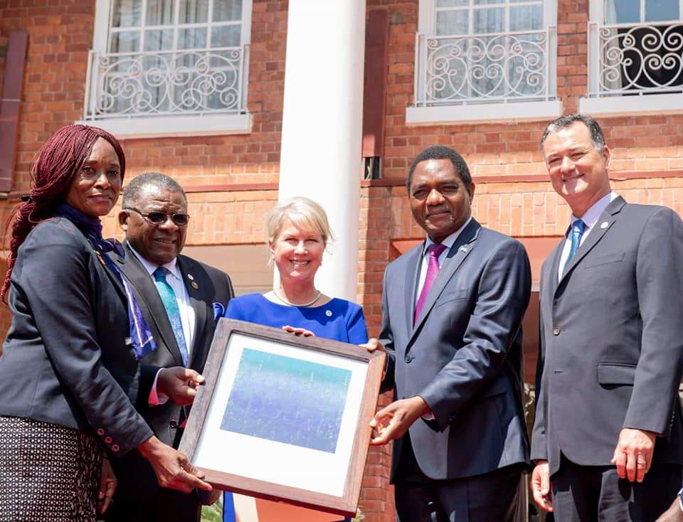 rotaryd9214's tweet photo. Welcome to Rotary H.E Hakainde Hichilema! @Rotary International President @JenJonesRotary inducted Zambian President H.E Hakainde Hichilema as an honorary rotarian during her visit to Zambia.#imagineimpacttour , #RIPresidentVisitsUg https://t.co/cYcBynbz1k