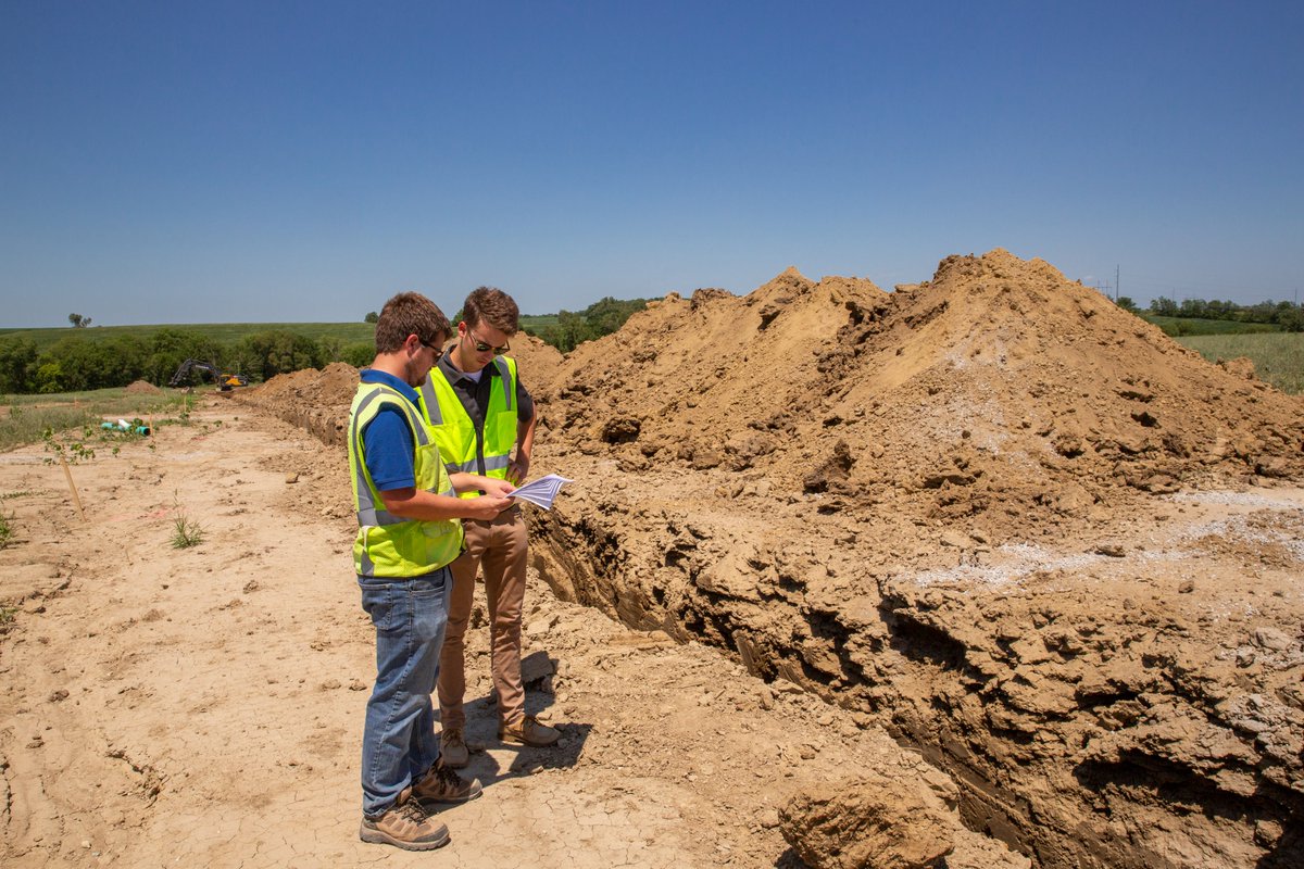 EACG1966's tweet photo. Jared Hemphill, EI, Civil Engineering Designer, and Alex Walter, Construction Administration Technician, recently visited the 192nd and Fort project to check on the construction of the sanitary sewer main. #engineeringanswers https://t.co/VhA4rXCNoM