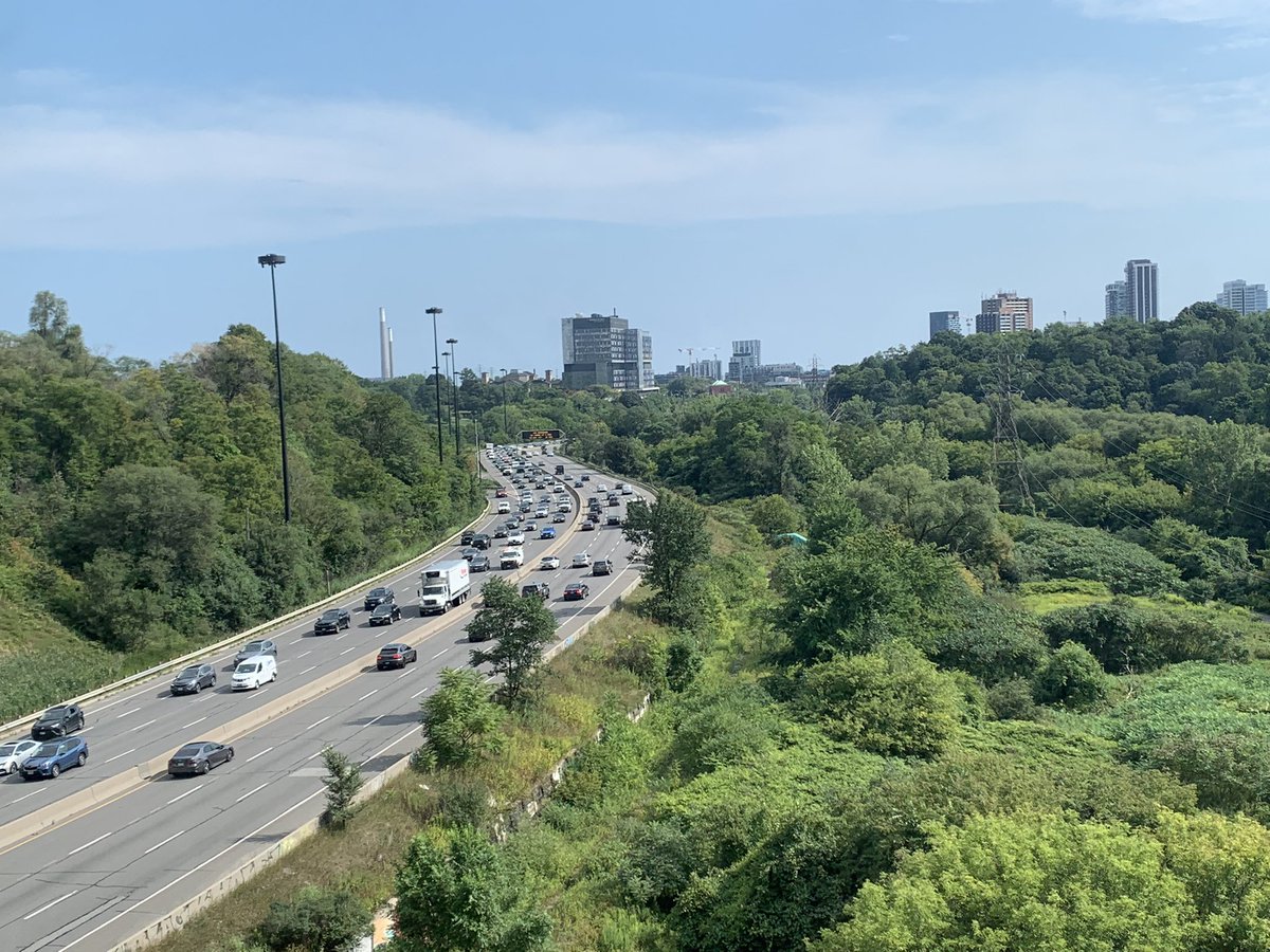Hebsyman's tweet photo. Don Valley Parking Lot. 4 pm. Photo taken from a westbound subway car on the #2 line. #Toronto #CommuterHell https://t.co/ATofL6CudK