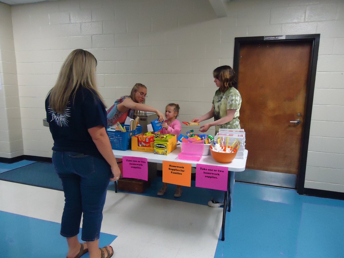 Dr. Cameron and Ms. Smith welcoming  our students and parents back to in-person Title 1 Night: Fired Up for Reading. <a href="/HeardMixon/">Heard-Mixon</a> #NCSSbetheBest
