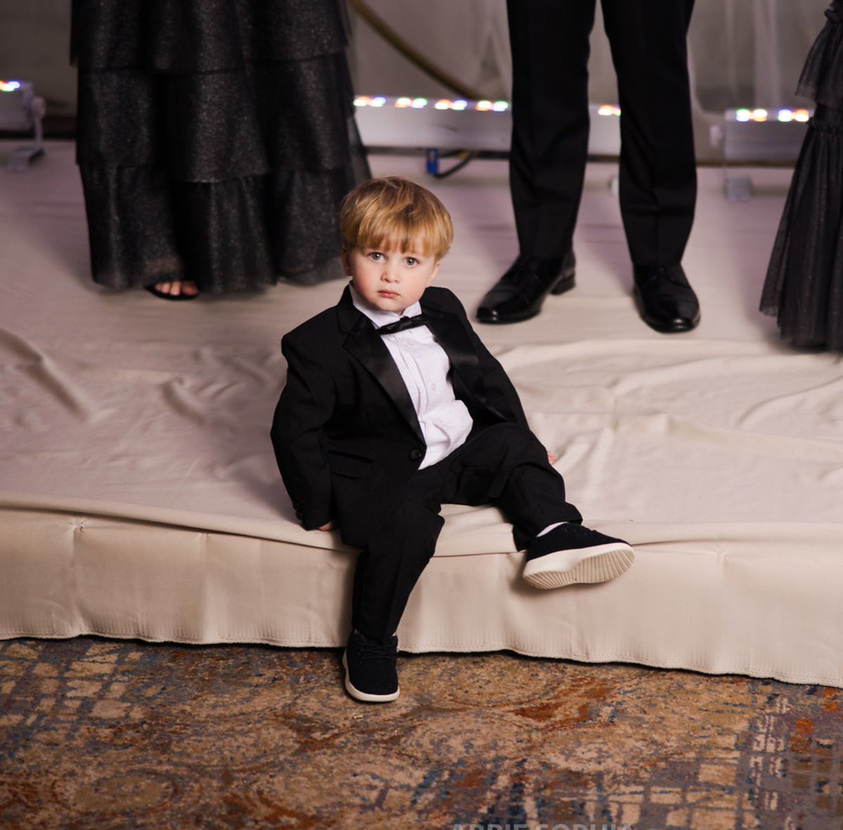 My nephew rocking baby <a href="/Allbirds/">Allbirds</a> and a tux should absolutely be the new wedding standard