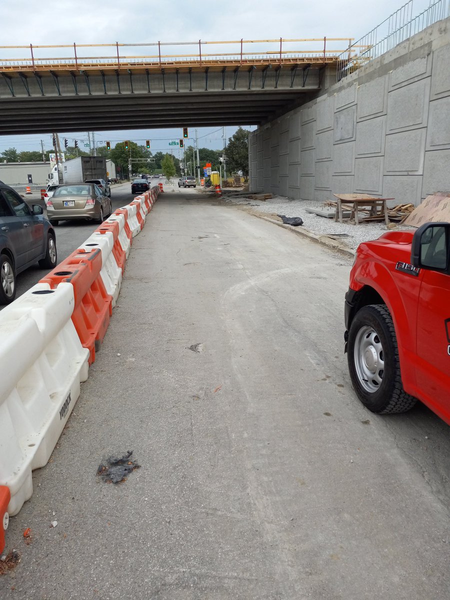 EricMBurgeson's tweet photo. @superior1938 Can we talk about unblocking the bike lane on New York under tomorrow night?  Pulling up the pickups would have solved it. https://t.co/WAACzBmmSV