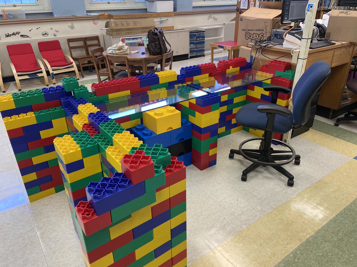 becsjen's tweet photo. I love the support I get from my friends and bosses when I get crazy ideas.  We replaced half of my desk at school with a Lego desk. Yup those are giant Legos and I built the desk.  The best part is When can change it whenever we want #FutureReady @ftsd_jensen https://t.co/V408PDnF3x
