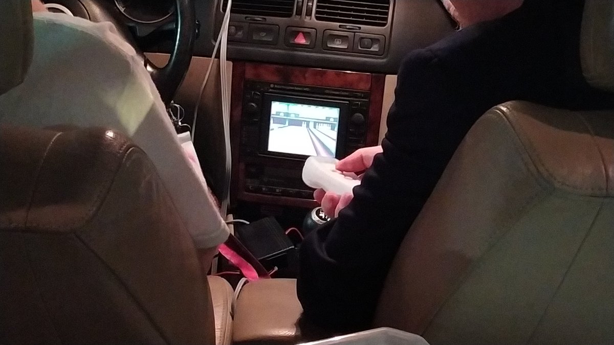 SandroStuff's tweet photo. Wii Bowling in a car hits different @eurofurence https://t.co/H5zIzS5NxJ