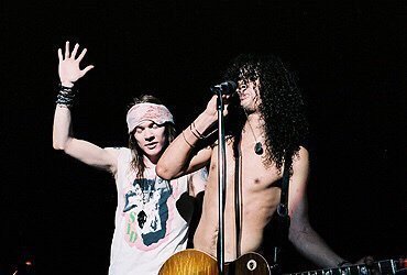 crockpics's tweet photo. Slash and Axl Rose on stage in Dallas, Texas during the Appetite for Destruction tour, 1987 https://t.co/6EfAC1D8rU