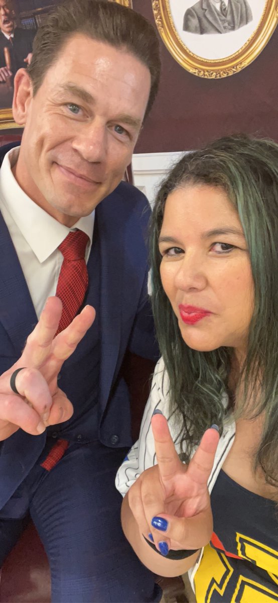 cenagirl99's tweet photo. My pics with @johncena at the @thomasashbourne event ❤️ What a great time this was! I love how he loved seeing and holding up our pic from years back lol plus I made sure to tell him I’ve loved him for 20 years since the chain gang and #basicthuganomics 🥰 Thank you so much!!! https://t.co/5vgekWcRIy