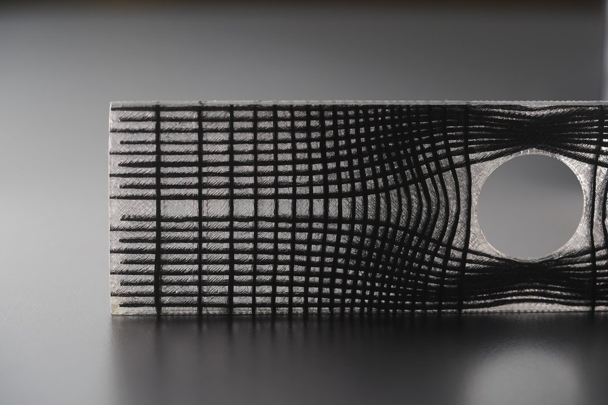 🧵On the benefits of fiber steering. 
#Fiber steering is the ability to controlling the #trajectories of #reinforcement threads and one of the biggest advantages of CFC #3Dprinting. It solves another issue: You can #reinforce parts with holes! 

#composites #additivemanufacturing