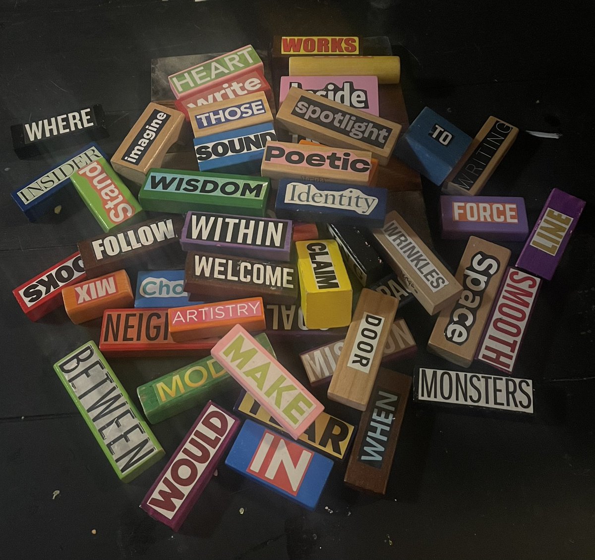 PaulWHankins's tweet photo. The backdrop for these small #BlockheadPoems are wood and stone coasters I found at the local Aldi. #BlockheadPoetry #Room407 https://t.co/xznzN72Jj6