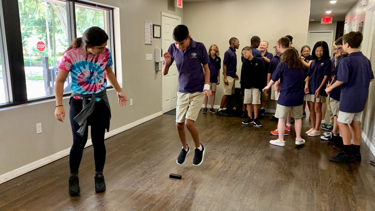 MSCatholicOrl's tweet photo. We're jumping into the weekend! Our middle school students got to practice their leaps during dance therapy. https://t.co/vqarqCurWD