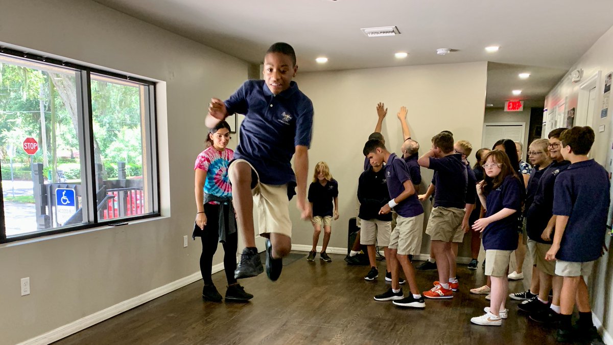 MSCatholicOrl's tweet photo. We're jumping into the weekend! Our middle school students got to practice their leaps during dance therapy. https://t.co/vqarqCurWD