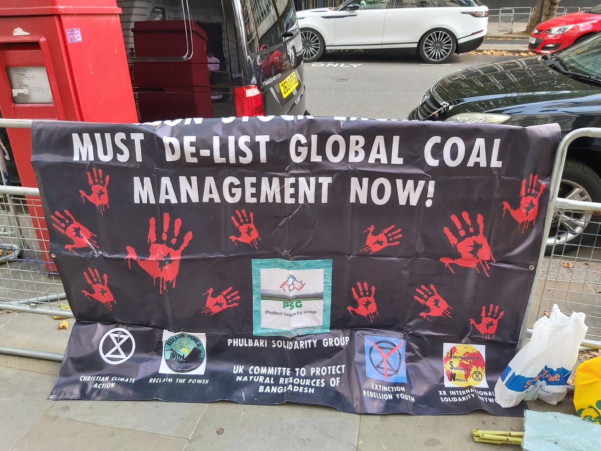 PSG_BD's tweet photo. We are here outside the Bangladesh High Commission today in support of #PhulbariDay commemorating the Massacre in Phulbari and the campaign against open pit mining. https://t.co/sTiMNTcB14