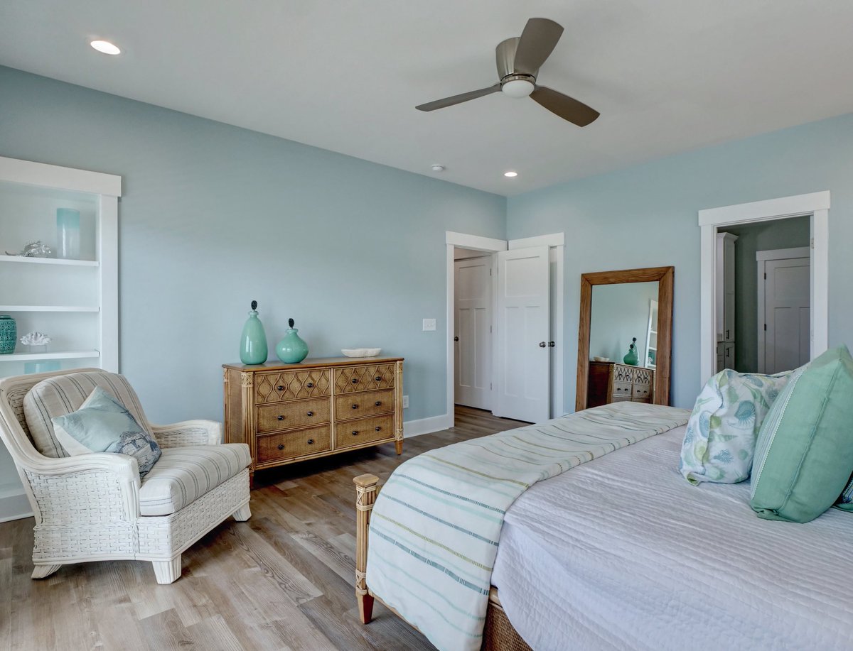 Just a handful of this Columbia Dresser left before it’s gone for good! Get it in any finish in less than a month! Somerset Arm Chair also shown here. Love this coastal bedroom design by Lorraine at Ashley Interiors!