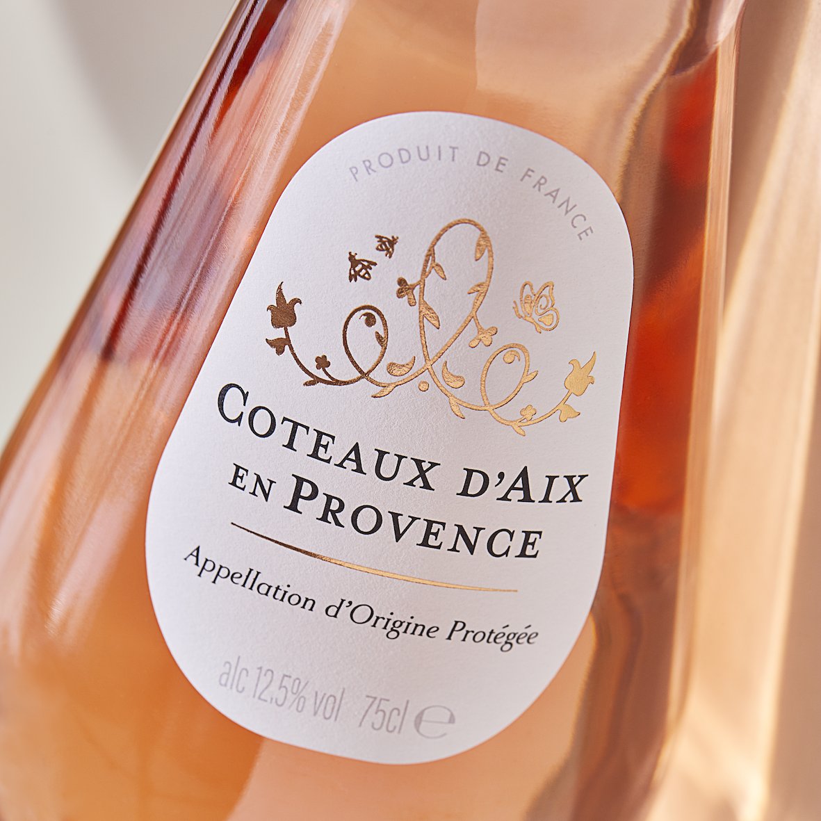 Delicate rose gold detail on the label of <a href="/Tesco/">Tesco</a>  Coteaux D'Aix En Provence Rosé complements the colour of the wine while evoking the beauty and nature of the Provence region.

#BeyondTheLabelDesign #labeldesign #wine