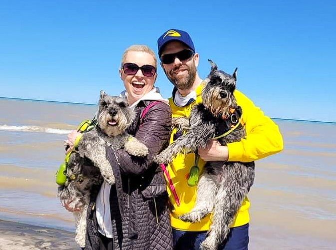 It's #InternationalDogDay! Excited to share this photo of our miniature schnauzers, Walter Mitty and Jackson Montgomery, in Two Rivers! 🐶