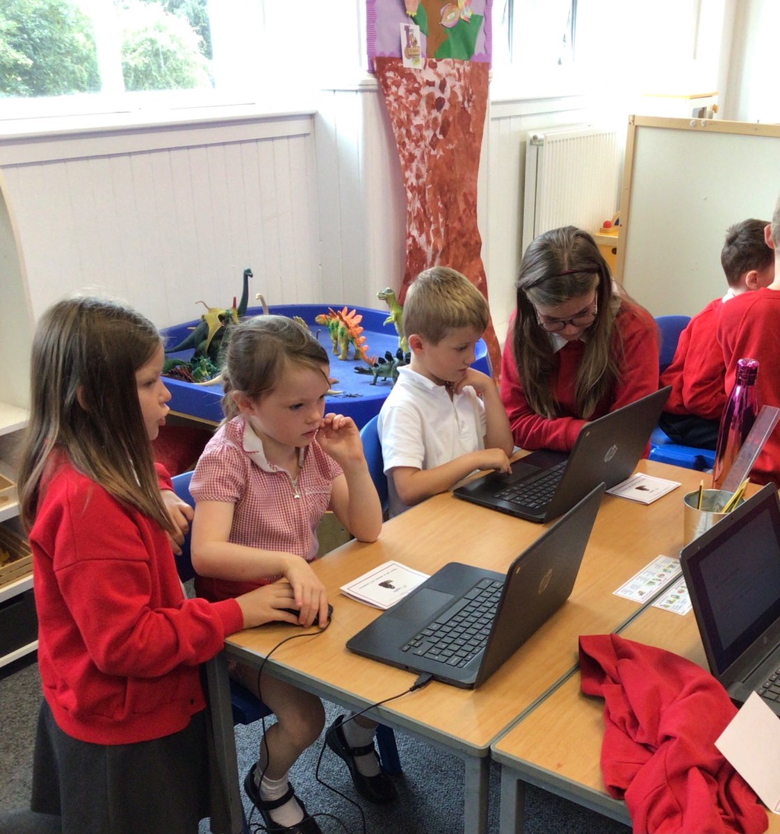 OrmistonPrimary's tweet photo. P6 came to P2 today to buddy up and help them create a google slide on the chromebooks about their favourite animal using images and text. Big thanks to P6 and well done to P2 on the wonderful slides you created ⭐️ #digilearscot #GoogleForEdu https://t.co/bVhAiJ6Ear
