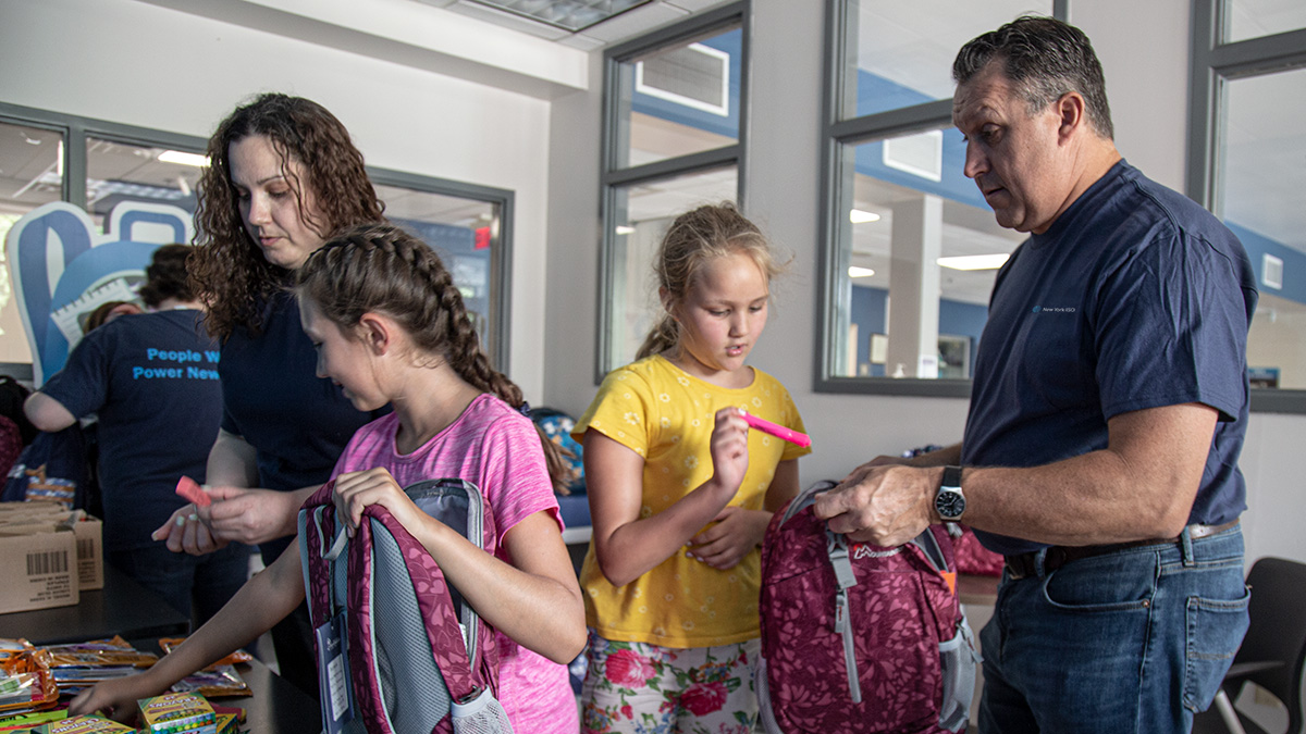 NewYorkISO's tweet photo. Thank you, Carin Lane, for your enthusiasm leading the #PeopleWhoPowerNY in the 2022 @CD_YMCA Running Start #BackpackProgram. This fantastic community effort equips local children with needed school supplies, shoes, and clothing for a successful start to the school year. 📚 #CSR https://t.co/SnLwrXGqoQ