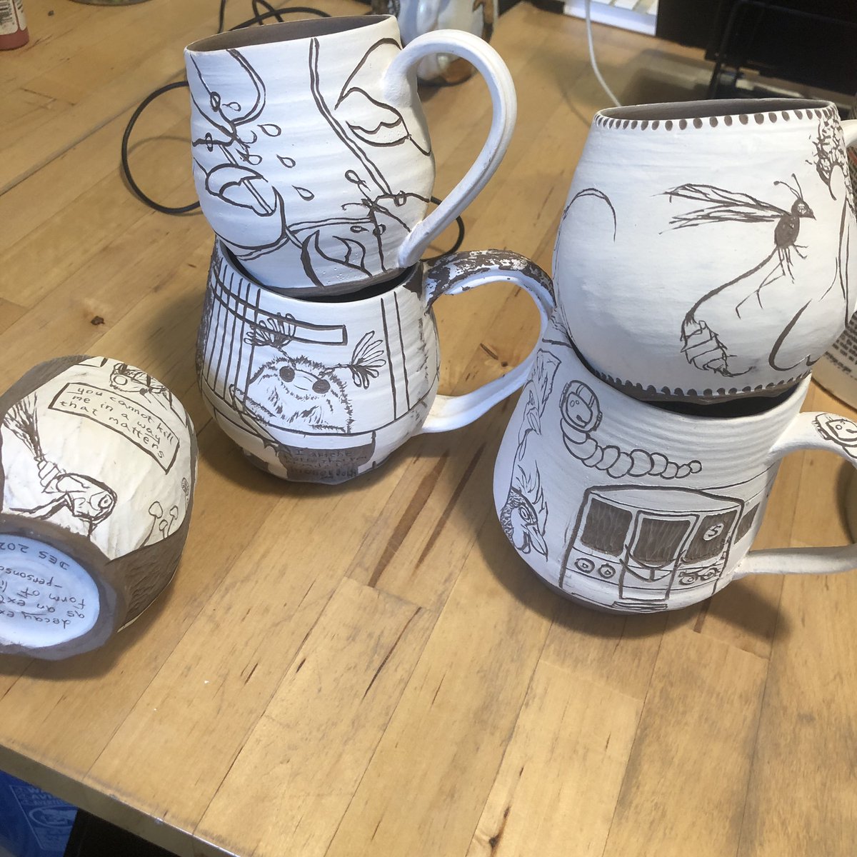 Nothing recently finished here in time for this #InverteFest, but I do have a bunch of relevant mugs in-progress just waiting to be glazed
