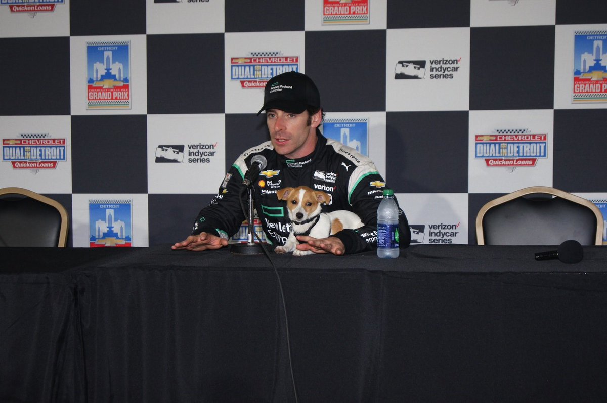 detroitgp's tweet photo. It’s #NationalDogDay and we are flashing back to one of our favorite track pups - @NormanPagenaud! Remember 2016 when Norman met with the media after dad @simonpagenaud finished as runner up on Sunday at the @Chevrolet #DualInDetroit at #DetroitGP? He did a doggone good job. #FBF https://t.co/3Xu6fLlSor