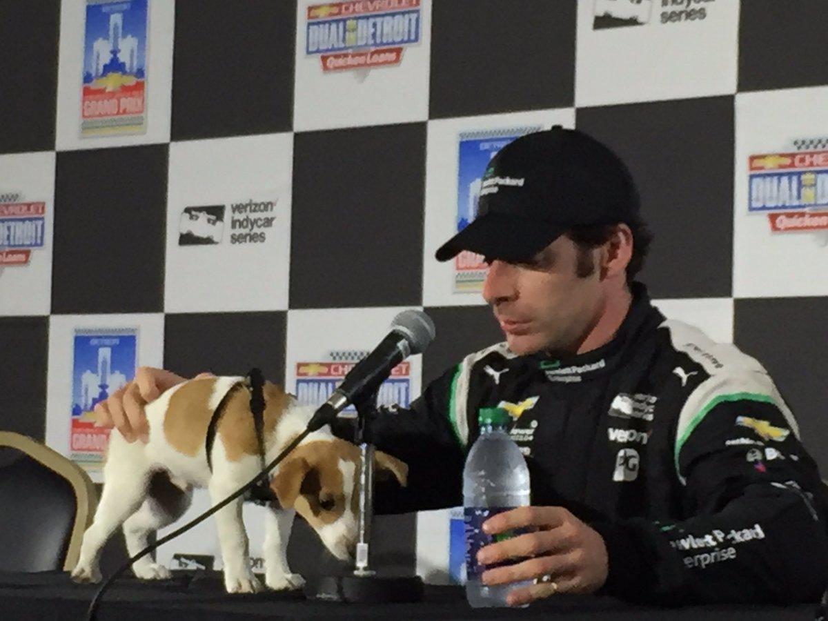 detroitgp's tweet photo. It’s #NationalDogDay and we are flashing back to one of our favorite track pups - @NormanPagenaud! Remember 2016 when Norman met with the media after dad @simonpagenaud finished as runner up on Sunday at the @Chevrolet #DualInDetroit at #DetroitGP? He did a doggone good job. #FBF https://t.co/3Xu6fLlSor