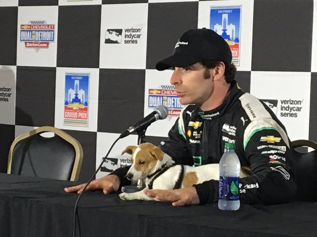 detroitgp's tweet photo. It’s #NationalDogDay and we are flashing back to one of our favorite track pups - @NormanPagenaud! Remember 2016 when Norman met with the media after dad @simonpagenaud finished as runner up on Sunday at the @Chevrolet #DualInDetroit at #DetroitGP? He did a doggone good job. #FBF https://t.co/3Xu6fLlSor
