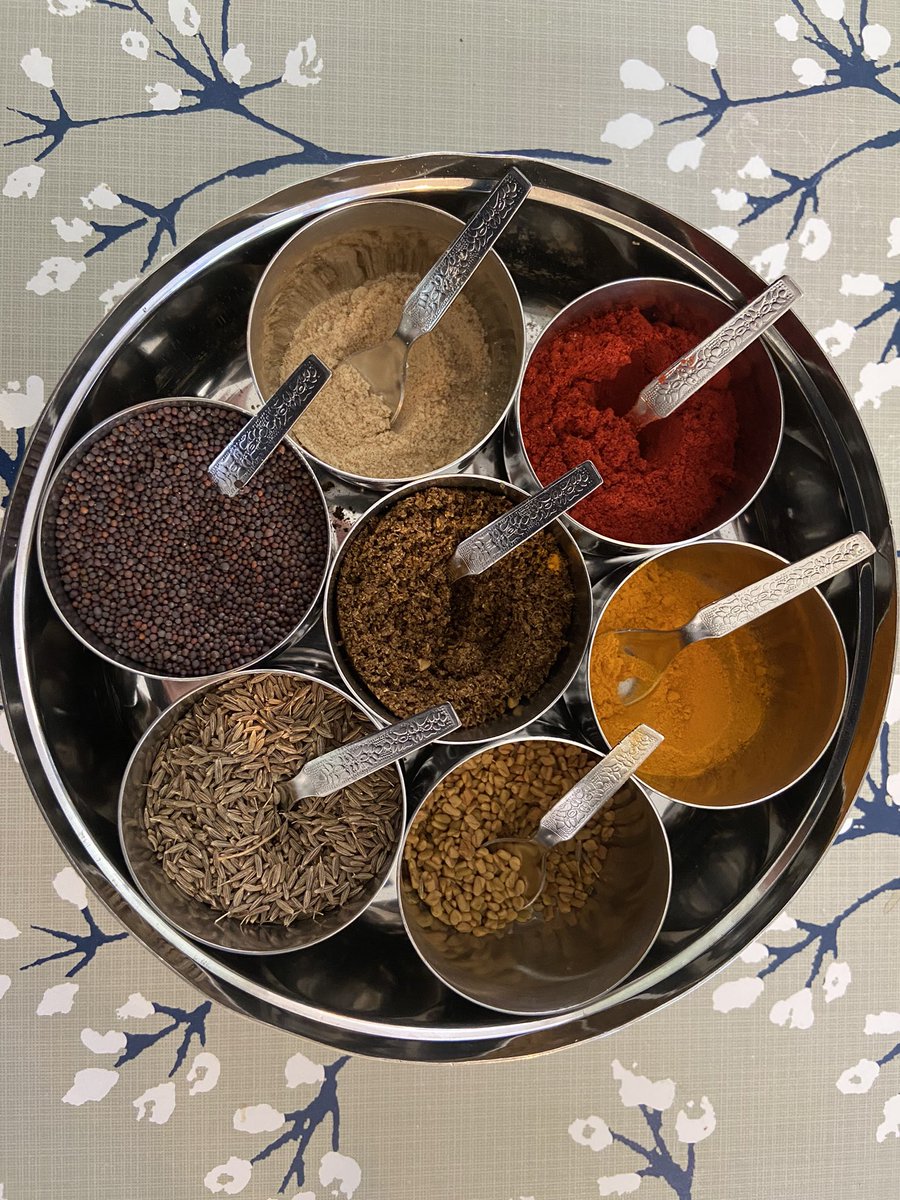 wouldbscientist's tweet photo. Every 3 months or so, I clean and refill my masala dabba—a staple in most Indian households. My dabba has turmeric, fenugreek seeds, cumin seeds, mustard seeds, asafoetida, red chili powder, and Maharashtrian goda (sweet) masala. What does yours have? https://t.co/OxwjYTzfCV