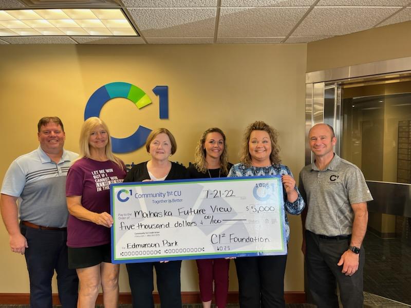 Community1stCU's tweet photo. The C1st Foundation recently made two $5,000 grant donations to Mahaska Future View, for the Edmondson Playground Project in Oskaloosa and to @cvhhinfo to help serve more qualified homeowners through critical home repairs in 2022. #TogetherIsBetter #c1stcu https://t.co/bnPpto9Muk