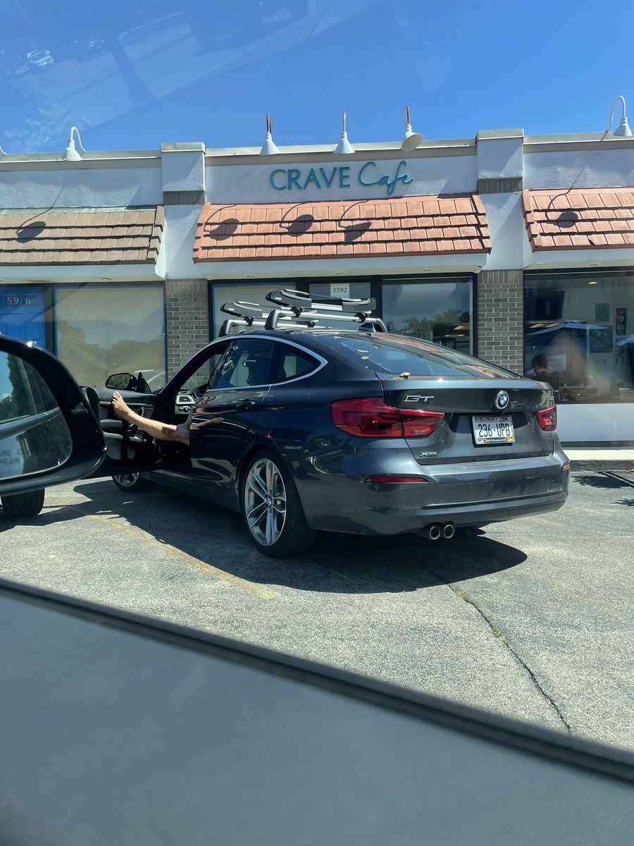 Evanino12's tweet photo. Dogs out in the crave cafe parking lot on a Friday afternoon! https://t.co/D7KKbuT43p