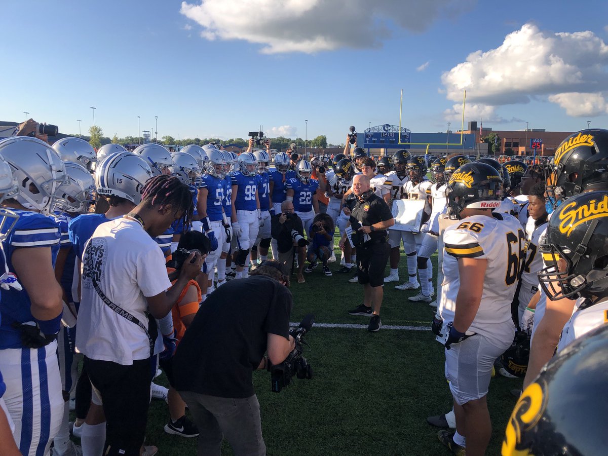 SniderAthletics's tweet photo. A great moment of community and a heartfelt meeting of two great teams. Snider presented Carroll a few gifts that included a donation to the American Cancer Society in memory of Owen Scheele. https://t.co/RyUIRnTE8b