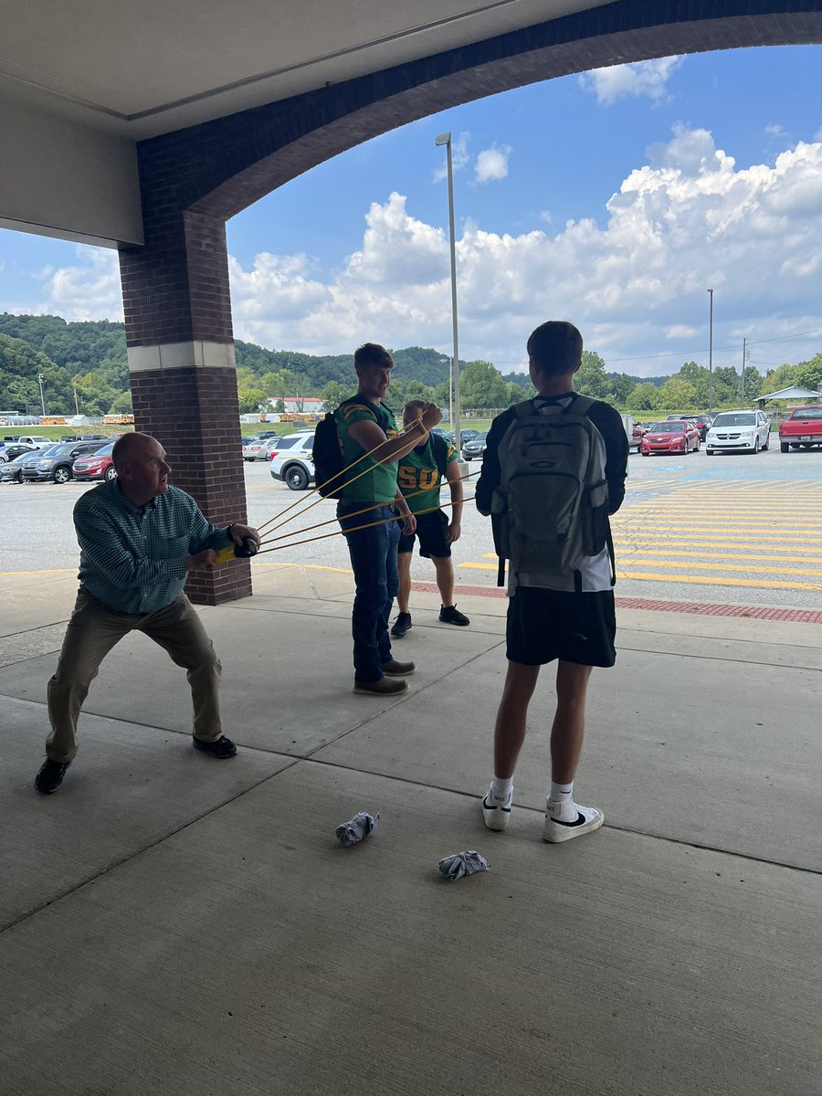 KamSlateGC's tweet photo. Pep rally prep with the principal! Had to get our t-shirt slingshot angles just right for this afternoon! It was a team effort! #GCAllForOne #BelieveinGC https://t.co/jBWvBhCpYn