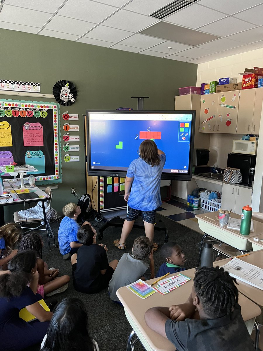 We’re really enjoying our new touch screen Promethean board! Today we used it to help with our area and perimeter lesson! 🟥🟨🟦🟩 <a href="/NFP_Elementary/">North Forest Pines</a>
