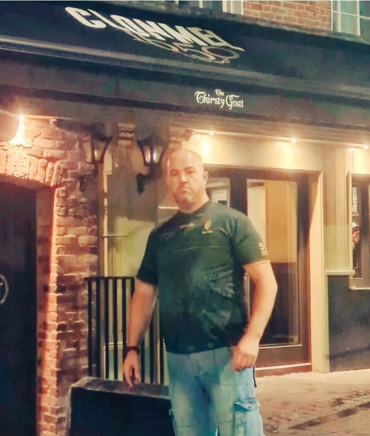 JohnKelly1948's tweet photo. This is Jackie Duddy outside the Thirsty Goat after being refused service because he was wearing a Bloody Sunday 50th anniversary commemorative top.  The employee said it was political and offensive. What an insult to the memory of the innocent victims of Bloody Sunday. Shameful. https://t.co/YApygxocY9