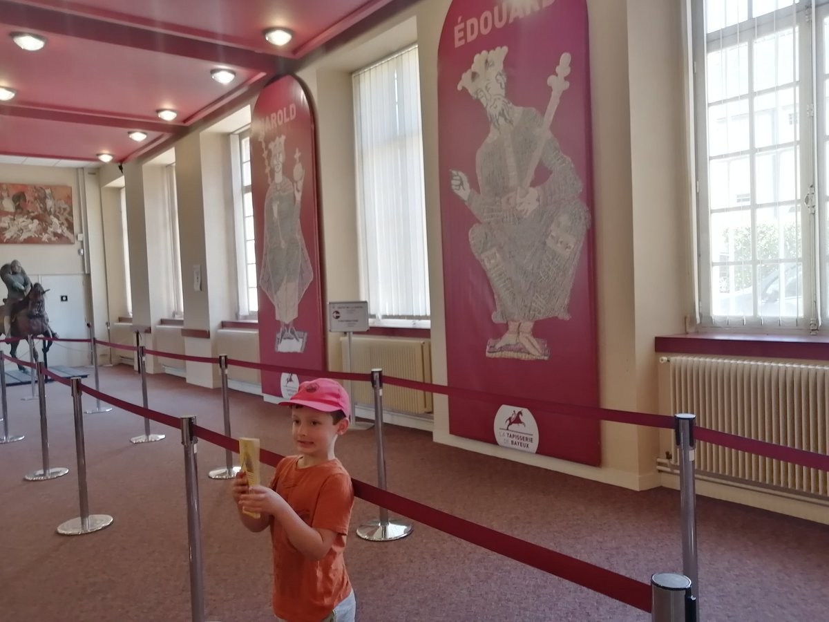 Lauraajpw's tweet photo. #FOGReading Robin reading the 'The Stormin' Normans' at the Bayeux Tapestry Museum https://t.co/emQDy9mHsk