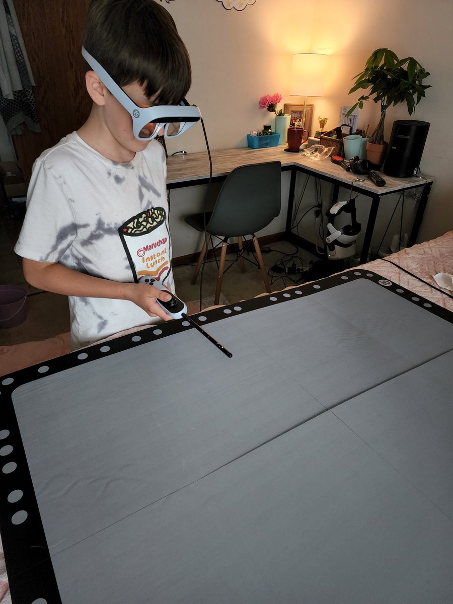 This has been a rough week. My kids were all sick and throwing up, which is why this couldn't have come at a better time. I finally got my <a href="/tiltfive/">Tilt Five</a>!!! It is an immediate recovery for this kid lol. Now I need to pry the wand out of his hand. 😊🎉✨️