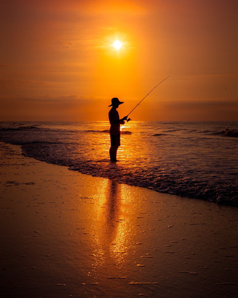 Early morning fisherman at the beach. #canon5dmarkiv #canonphotography #sunrise #beachlife