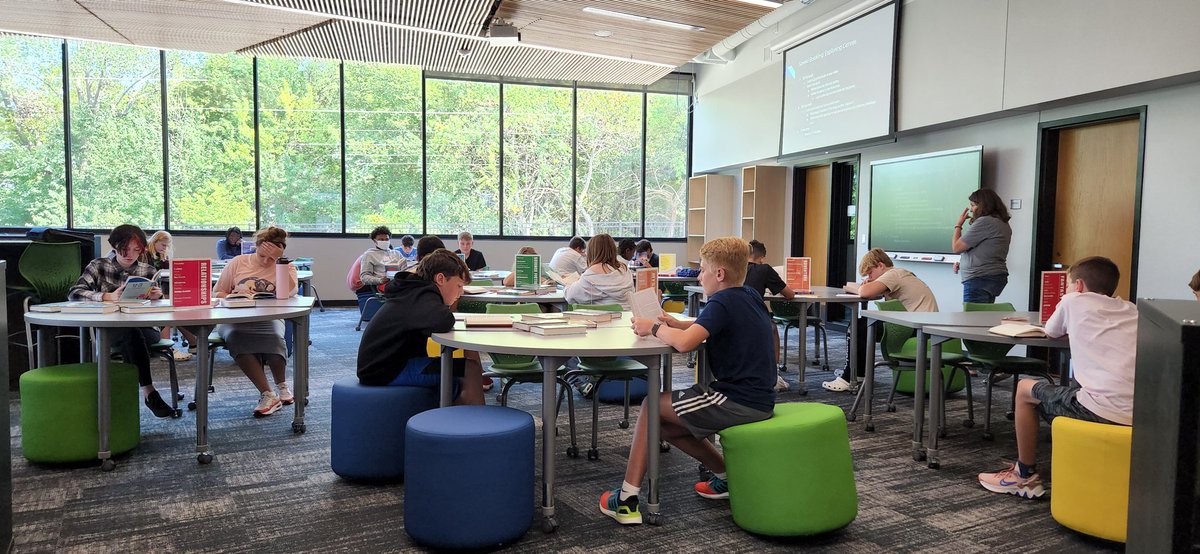 etmslibrarian's tweet photo. History in the Making: The first week for @ETMSbison to visit the library. Pictured are 8th graders exploring genres through a Speed Booking activity. https://t.co/NXS71DPC4h