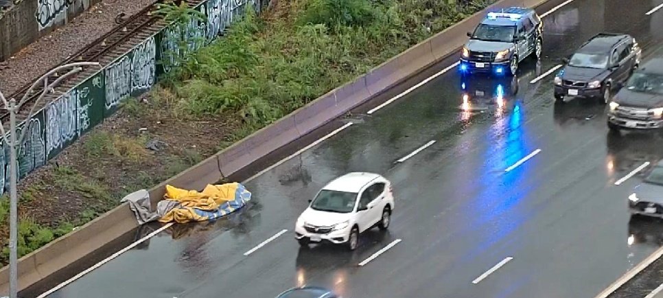 BarstoolBoston's tweet photo. Tragedy has struck the Boston area. During the evening storm, the Inflatable lock on 93 blew off and landed deflated on the lanes of 93. #RIP https://t.co/2ZqoPebyhJ
