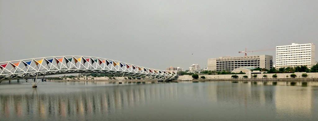 Indian_projects's tweet image. The iconic #AtalBridge is a pedestrian overbridge on #SabarmatiRiverfront - the fabric studded bridge is also a tribute to the textile heritage of #Ahmedabad city. A spectacular new landmark for the city. To be inaugurated by the PM, Shri @narendramodi today