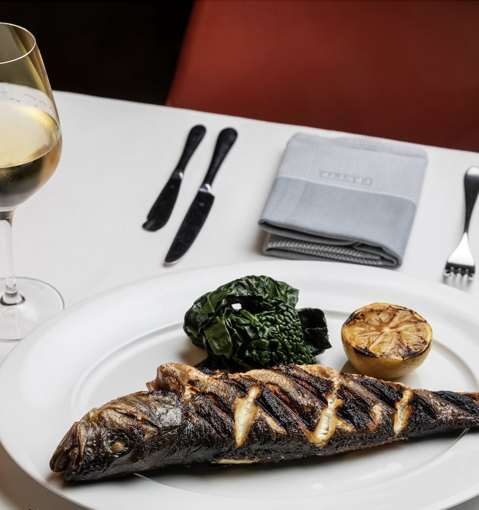 Whole Branzino | cavolo nero, grilled lemon. ​

#ElisaSteak