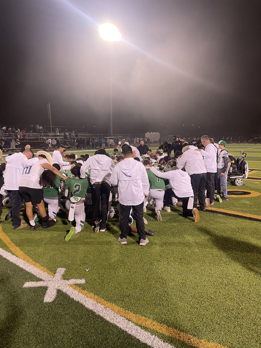 Knights and Eagles pray together after tonight’s game.