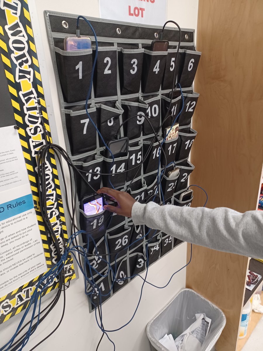 MrKevinSlater's tweet photo. Our cell phone parking lot has worked flawlessly. Students WANT to park their phones in class for the opportunity to charge iPhone or Android while parked. #NISDignited #NISDFolks #nisdmsmath https://t.co/J0os4O53gR