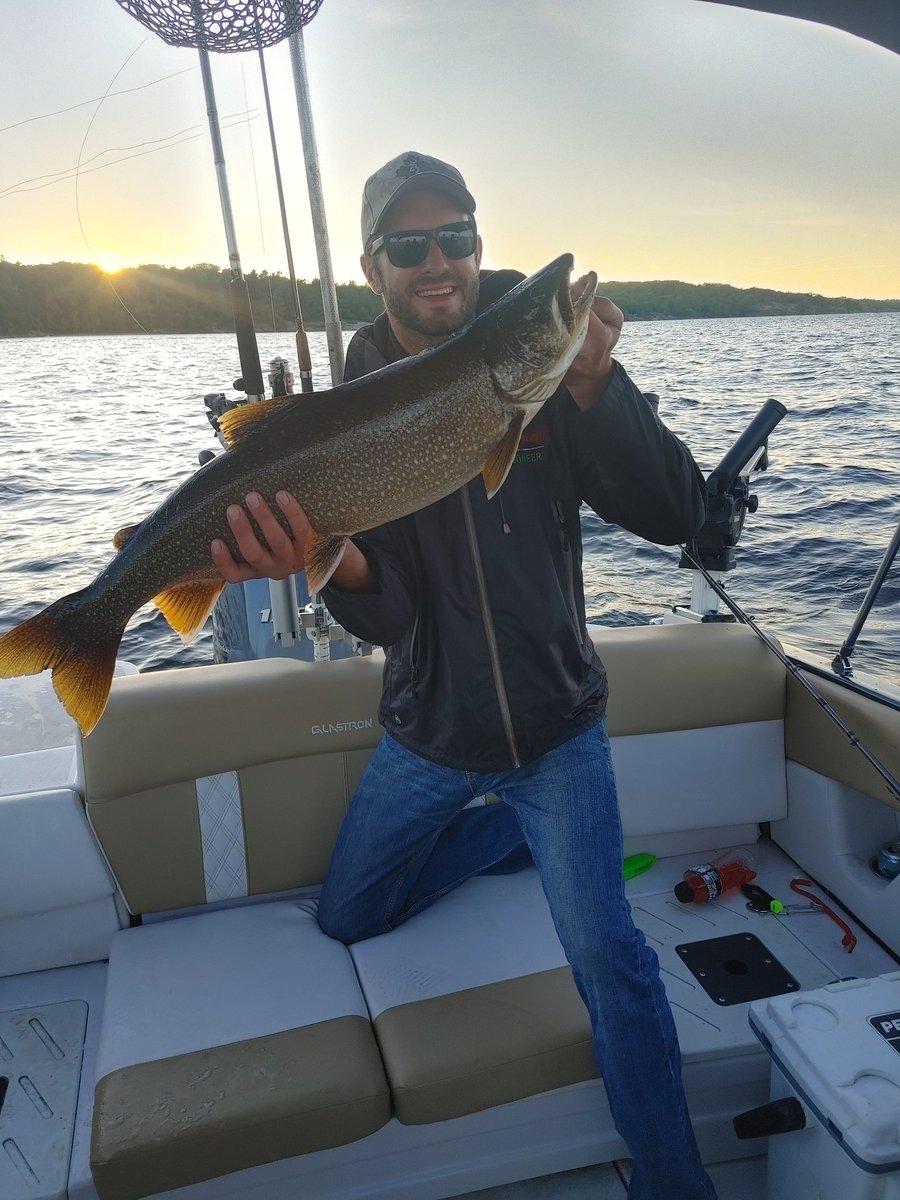 Fishing  in Parry Sound.  Jack Boekhorst landing a monster Laker this eve.