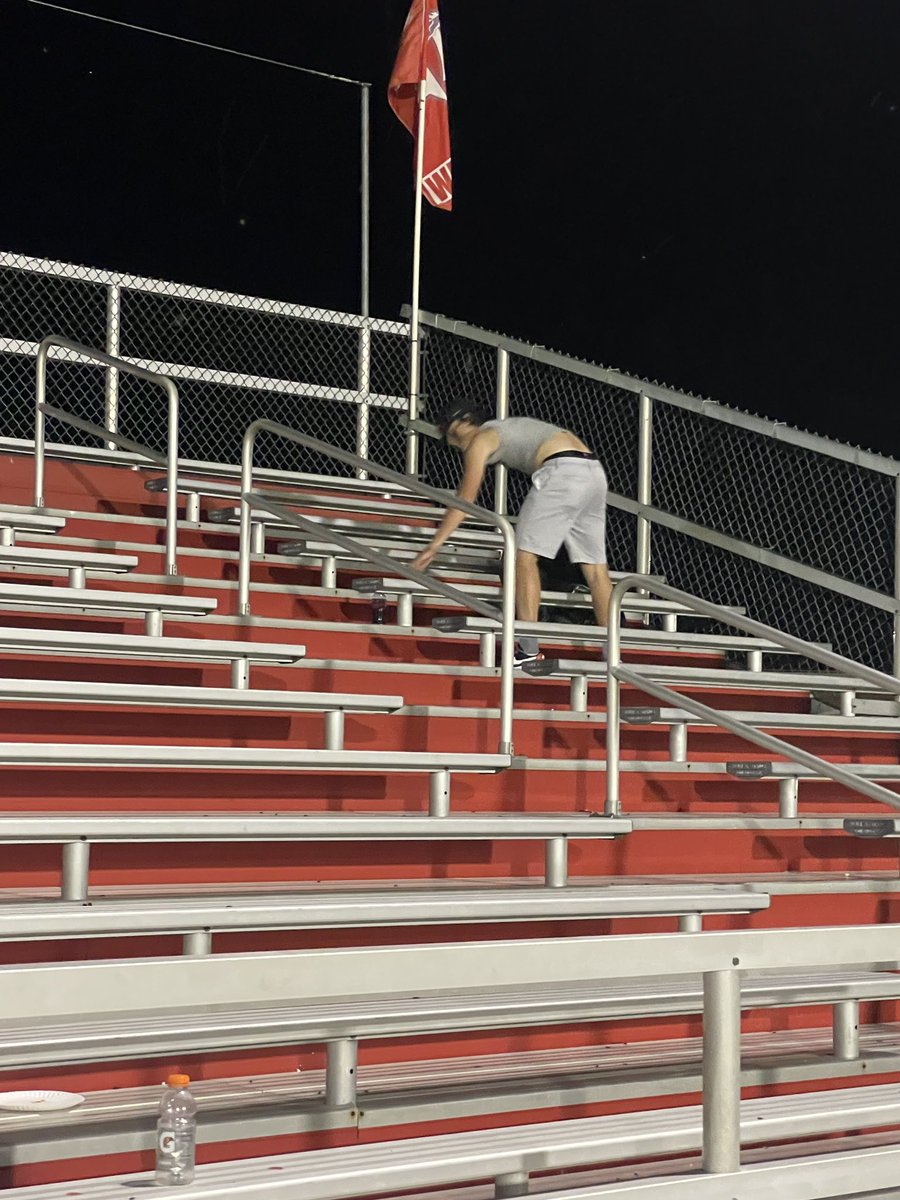 Goshen_Athletic's tweet photo. It’s 10:20p and Logan Haley (Starting QB) is helping clean the stands after tonight’s victory!!! @GHS_OH_Football @GoshenLocal @GoshenWarriors https://t.co/XNrI3RWRf1