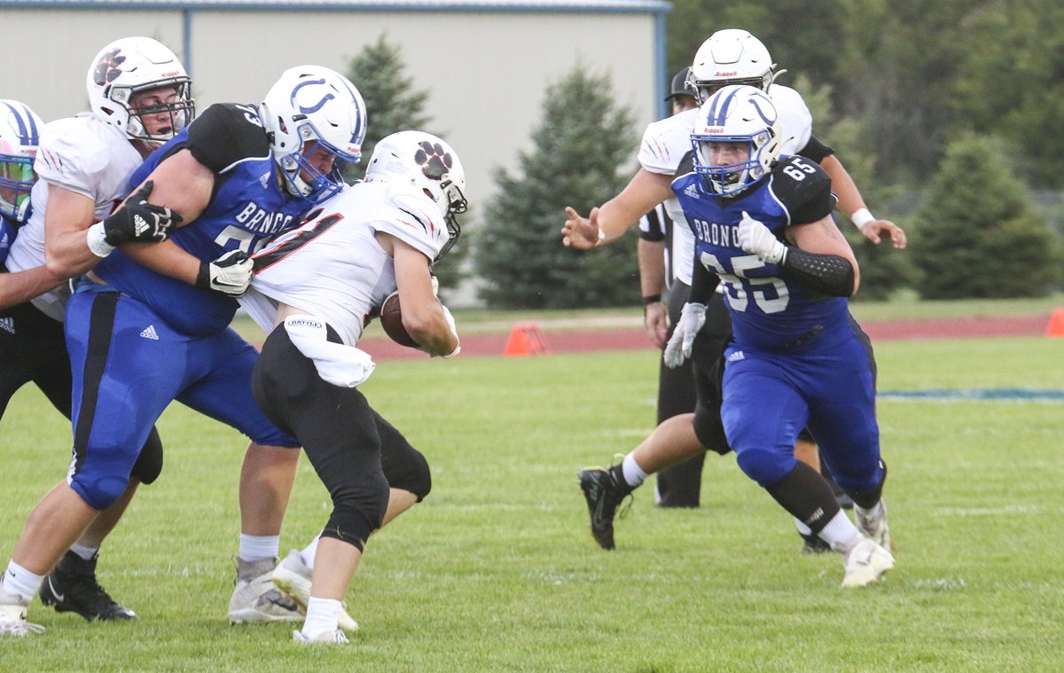 SCIStephanie's tweet photo. FB: @GUMAMBA04 (73) and @utter_elijah (65) of @cpsbroncos make the tackle against North Bend. Elijah also had an interception for CHS. #broncoblue #defensewinsgames #holdyourposition https://t.co/Ae0E3tK0J0