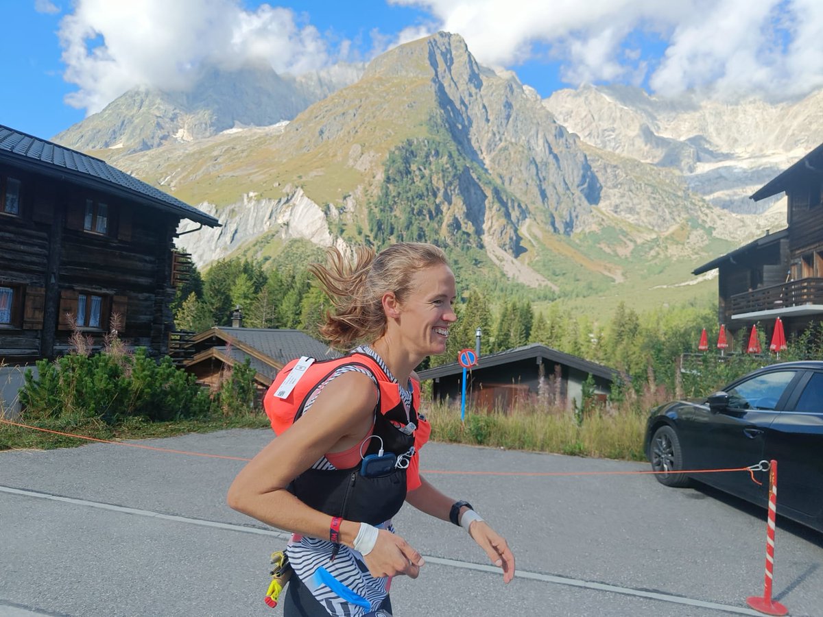 iRunFar's tweet photo. Emily Hawgood is the 5th woman to La Fouly. She's exactly 2h behind the women's race leader. All smiles and asking about the gap ahead. #UTMB https://t.co/VunTnmvt2k