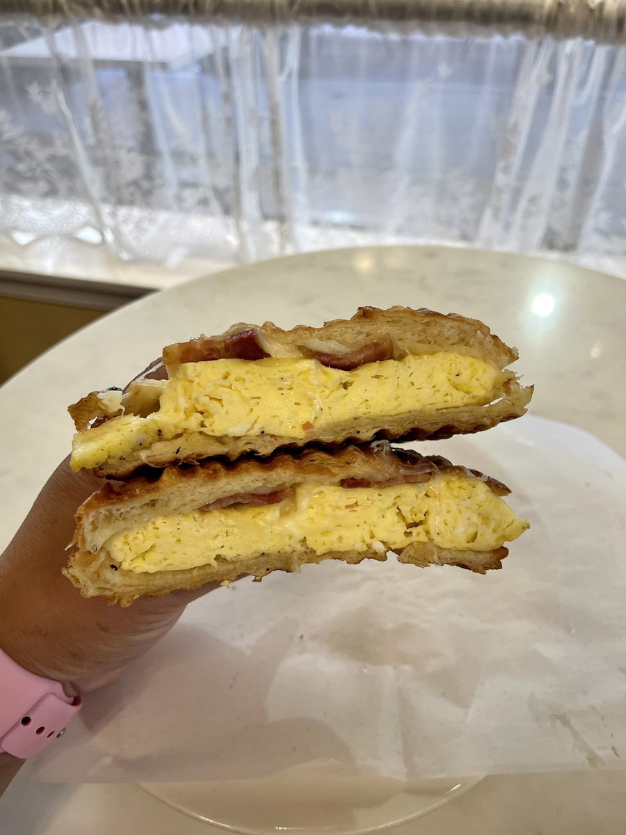 AnthonysICH's tweet photo. The Classic - Bacon, Egg &amp; Cheese on a fresh croissant - pressed on our panini grill - to start the weekend.  Served all day, everyday.   🥓🥚🧀 🥐. #anthonys #breakfasttime #9thstreet #coffeehouse https://t.co/LEIrFKm8SM