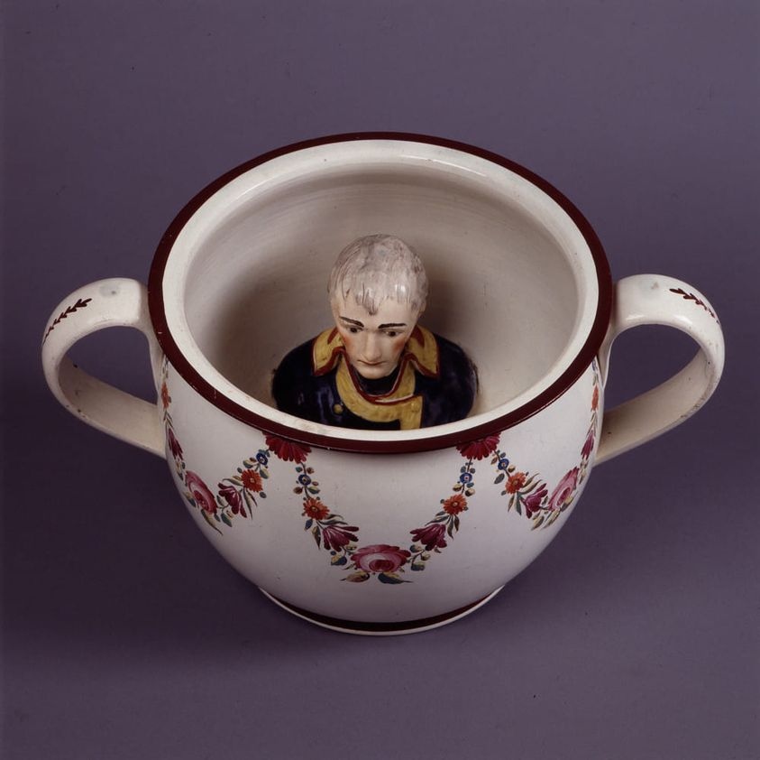 A British chamberpot with a built-in small bust of Napoleon Bonaparte, ca.1803-05.
