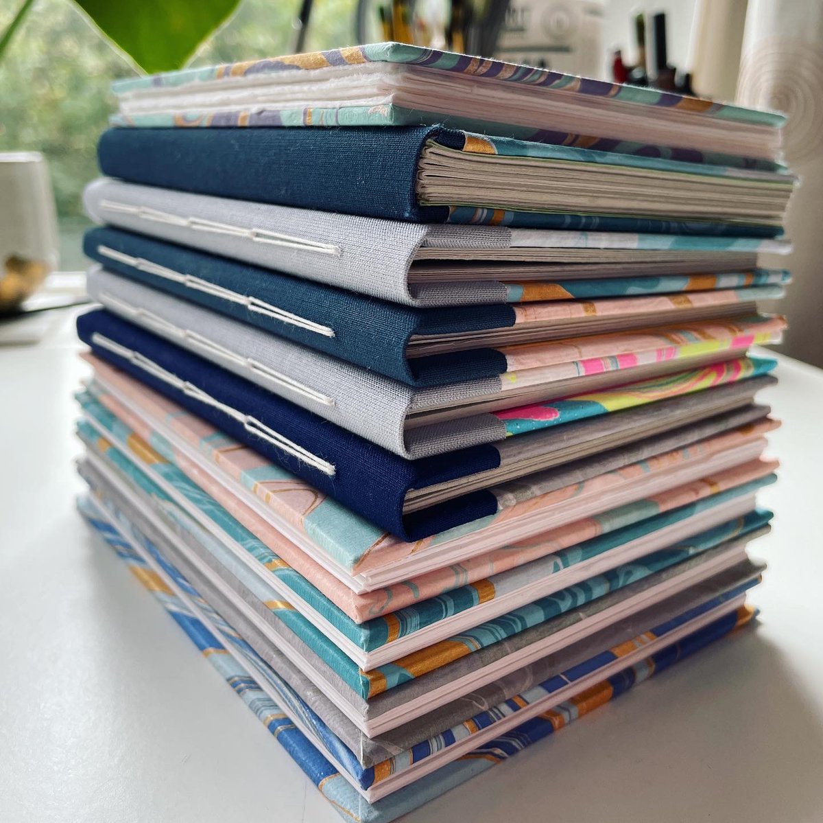 craftyvarda's tweet photo. All ready for this Sunday 28th pop-up shop! Come down for tea and paperblank goodness at @BirdandBlendTea  Glasgow Byres Road, 1pm-4:30pm. Cash and card accepted! You’ll find lots of eco-friendly notebooks to inspire your sketches, notes, shopping lists or existential questions📚 https://t.co/XTzATtFrc4