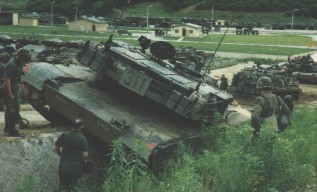 Korean_DMZ_Vets's tweet photo. Superb Tank Saturday - M1IP Abrams from 1st Tank (1st Battalion 72nd Armor, 2nd Infantry Division) a bit stuck at Rodriguez Range, Korea in 1990/91! #tanks #armor #superbtanksaturday #m1ip #m1abrams #2id #abrams #ilovetanks #tanklover #1stTank https://t.co/3knFveJd7m